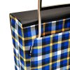 Zadni strana nakupni tasky na koleckach Jean Scottish Rolser