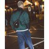 Herschel Kaine Ripstop Reflective Duffle Ultimate Gray/Stone Mountain 44L – fotografie v použití a detail modelu