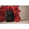 Herschel Retreat™ Small Quilted Capsule Black Tonal Daisy 17L – fotografie v použití a detail modelu